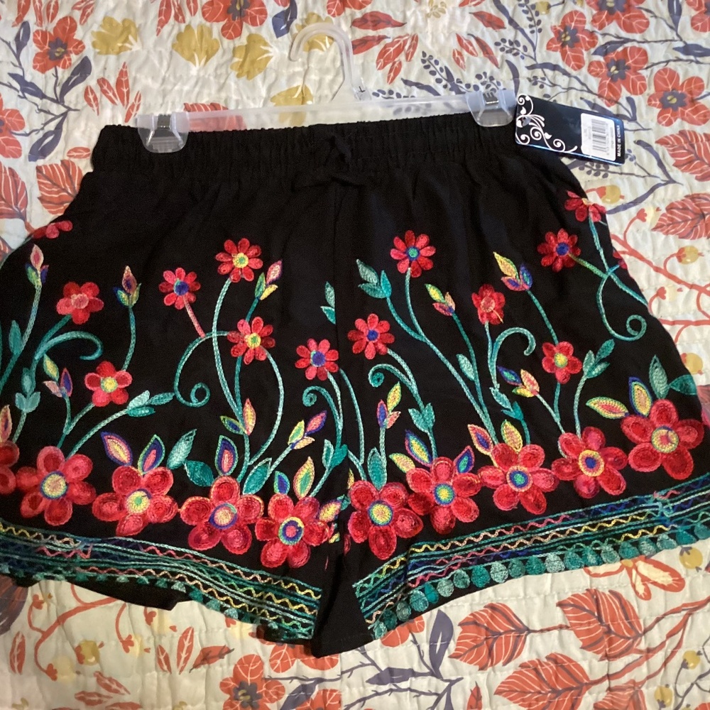 Black shorts with hand stitched flowers